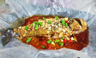  成都特色餐飲培訓學校，哪里可以學正宗紙包魚技術培訓？